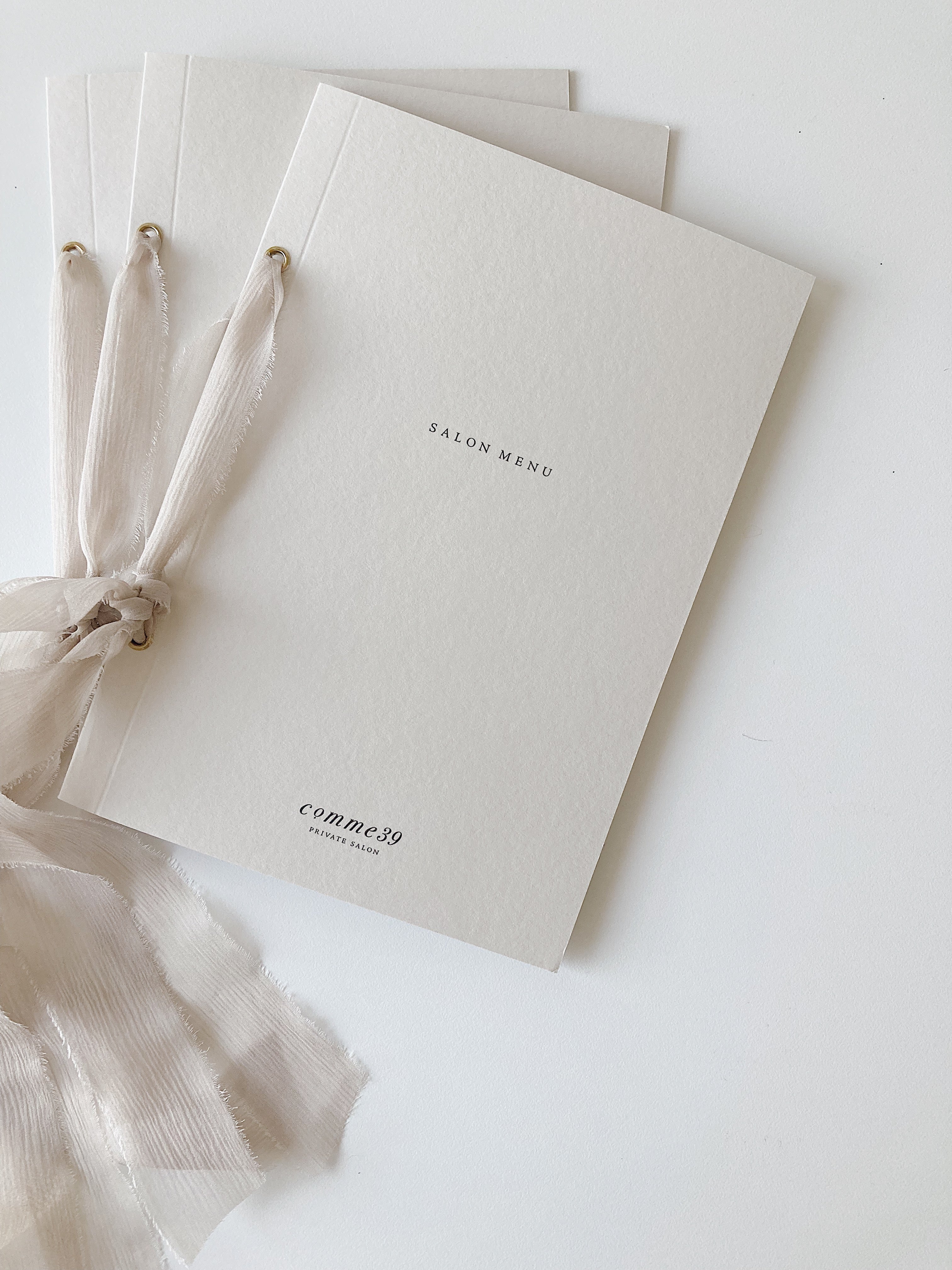 メニューデザイン ハトメ加工